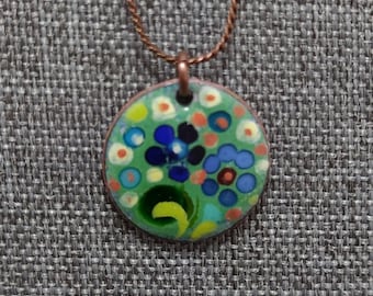Canadian penny pendant with glass enamel. Flowers necklace. Light blue flowers with yellow middle on deep blue background. Transparent back.