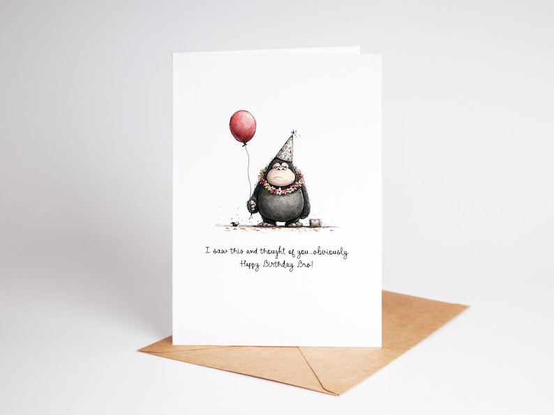 May include: A birthday card featuring a watercolor illustration of a gorilla holding a red balloon and wearing a party hat and a floral lei. The card has the text: "I saw this and thought of you...obviously Happy Birthday Bro!"