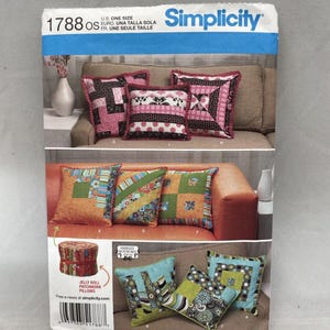 May include: Simplicity sewing pattern 1788 for patchwork pillows. The package displays various square pillow designs featuring diverse fabric patterns, colors, and textures, including pink, black, green, and blue prints with ruffled edges.