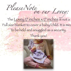 May include: A purple and white lovey blanket with the name "Mackenzie" embroidered on it. The lovey is 17 inches by 17 inches and is shown being held by a child wearing pajamas.