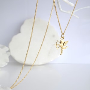 Sterling silver cupid disc pendant Sterling silver cupid disc pendant