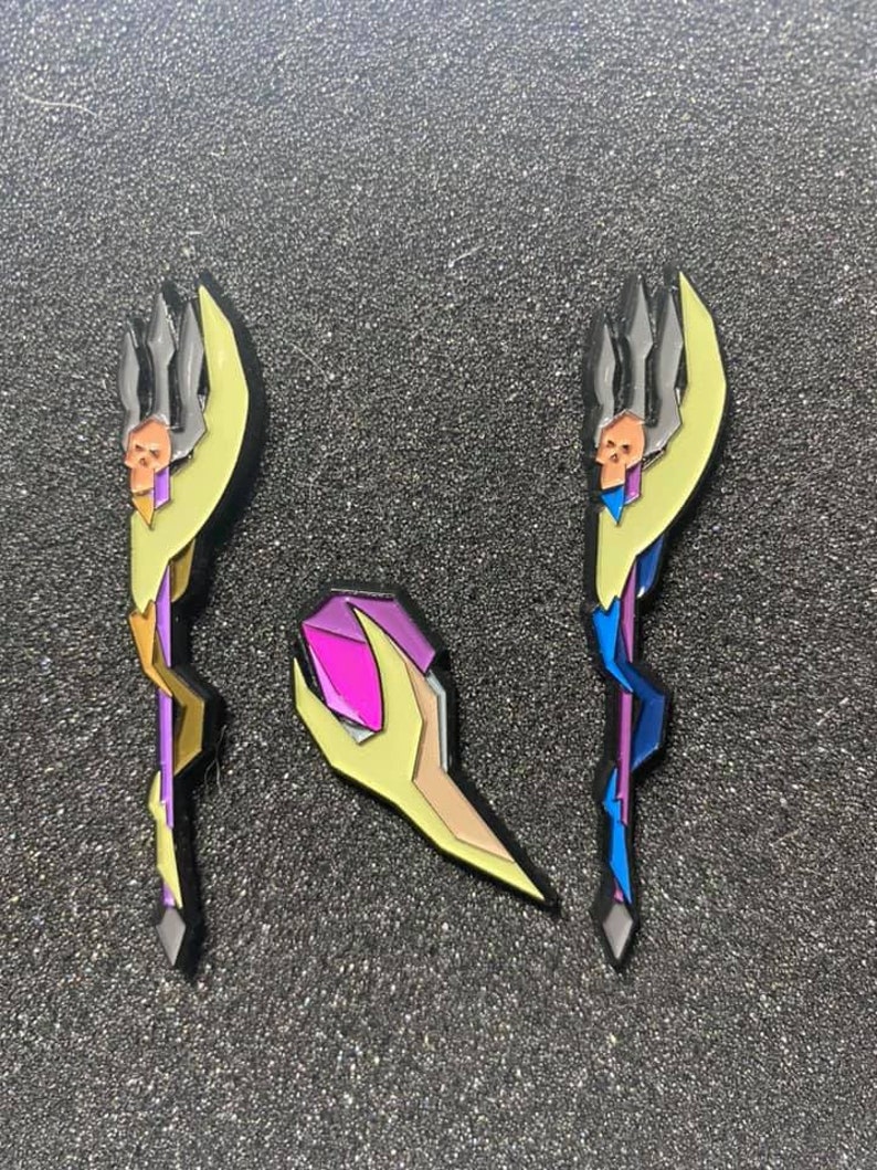 Magic Fang and Toxic Trident enamel pins Etsy