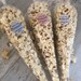 Ready to pop baby shower popcorn cones with personalised sticker and band to tie, choice of colours filled with delicious sweet popcorn