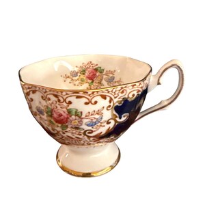 Bone China Salisbury England Vintage Tea Cup With Floral & Gold Detailing Blue Accents Intricate Design Footed Base Ornate Handle Numbered