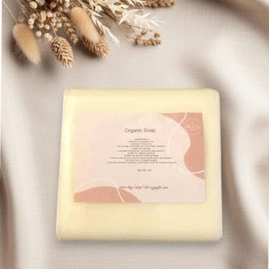 May include: A cream-coloured rectangular bar of organic soap. The label reads "Organic Soap" and lists ingredients. The soap weighs approximately 454 grams.