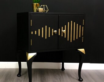 SOLD Record Cabinet with Sound Wave design in Black and Gold with Metal Gold Leaf Back