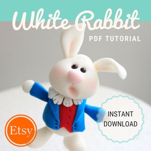 May include: A white rabbit wearing a blue jacket, red vest, and white collar, with a surprised expression. The rabbit is a fondant figure for a cake. The image includes the text "White Rabbit PDF Tutorial" and "Instant Download".