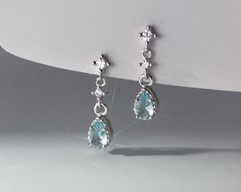Orecchini pendenti con moissanite e acquamarina a taglio a pera, in argento sterling placcato oro, con pietre preziose.
