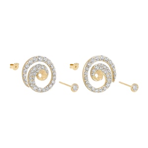 May include: A pair of gold-toned spiral earrings with clear, sparkling stones. The earrings have a post back and are accompanied by two smaller stud earrings with a single clear stone. The jewelry is set against a white background.