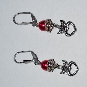 Earrings with angel on heart