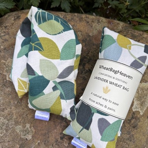 practical eco friendly, zero waste wheat bag vegan gift in a green spruce leaf cotton print fabric from WheatBagHeaven