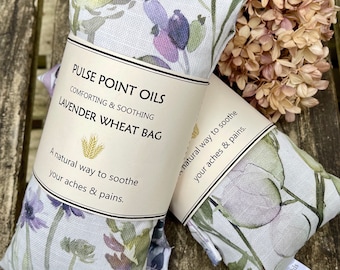 Wheat bag heated body wrap with lavender in botanical watercolour print. Gardeners essential heating pad care gift