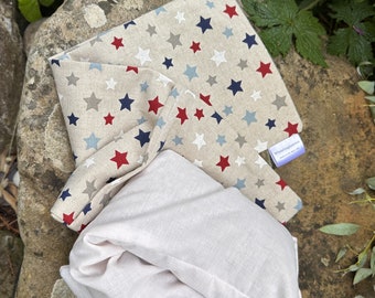 Star print heatable wheat bags with washable cover. Heat pad cold pack easing pain naturally aiding rest, relaxation and illness recovery