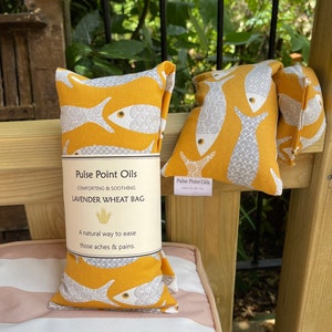 Long Holistic heat pad, lavender scented wheat bags, for aches and aches. care package heat wrap for new mum in yellow floral fish print. image 2