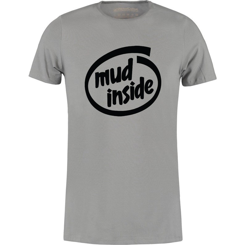 May include: A gray t-shirt with a black graphic of a computer chip with the text "mud inside" printed on it.