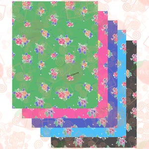May include: Five different patterned fabric swatches with a floral design. The swatches are arranged in a stack, with the green swatch on top and the black swatch on the bottom. The swatches are all the same size and have a white background.