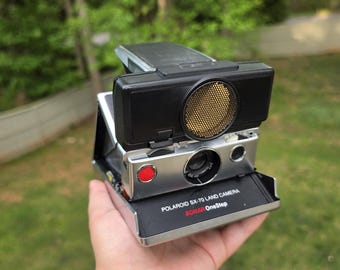 Cámara terrestre Polaroid SX-70 vintage Sonar One Step