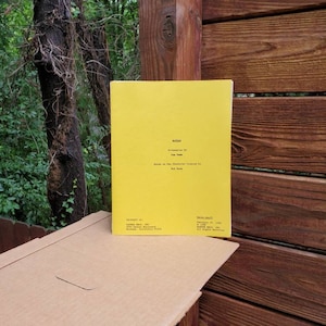 May include: A yellow screenplay titled "Radar" by Tom Tomm. The screenplay is based on the character created by Bob Kane. The property of Gardner Fox, Inc. Copyright 1987. All Rights Reserved. Burbank, California 91510.  Radar screenplay by Tom Tomm. Based on the character created by Bob Kane. Property of Gardner Fox, Inc. Copyright 1987. All Rights Reserved. Burbank, California 91510.