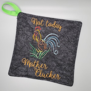 May include: A gray pot holder with a colorful embroidered rooster and the text "Not today Mother Cluckers".