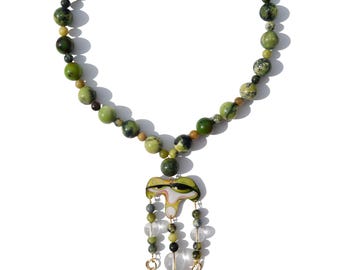 olivewing butterfly wings, green agate beads, glass beads, and evil eye inspired charm necklace