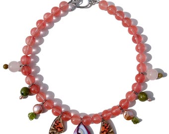 butterfly wings, cherry quartz, rose quartz, peridot, green agate beads, pearls, evil eye necklace
