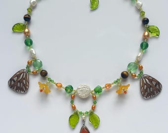 butterfly wing charm necklace with freshwater pearls, tiger's eye, preciosa crystals, faceted glass beads