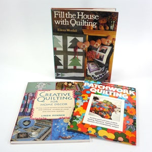 May include: Three quilting books with colorful covers. The top book is titled "Fill the House with Quilting" by Eileen Westfall. The middle book is titled "Creative Quilting for Home Decor" by Linda Denner. The bottom book is titled "Patchwork Quilting" by Homes and Gardens.