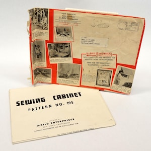 May include: A white sewing cabinet pattern booklet with the title "Sewing Cabinet Pattern No. 195" and the text "Created by U-Bild Enterprises Van Nuys, California National Headquarters for the U-Bild Tourist Club All Rights to this Pattern are Hereby Reserved".