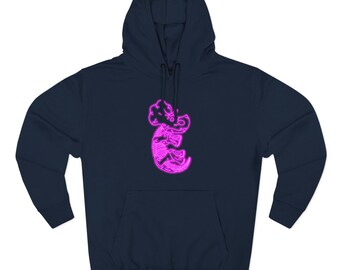 May include: Navy blue hoodie featuring a neon pink dragon design on the front. The dragon is stylized with intricate details. The hoodie has a drawstring hood and a front pocket. This sweatshirt is a comfortable and stylish apparel item.
