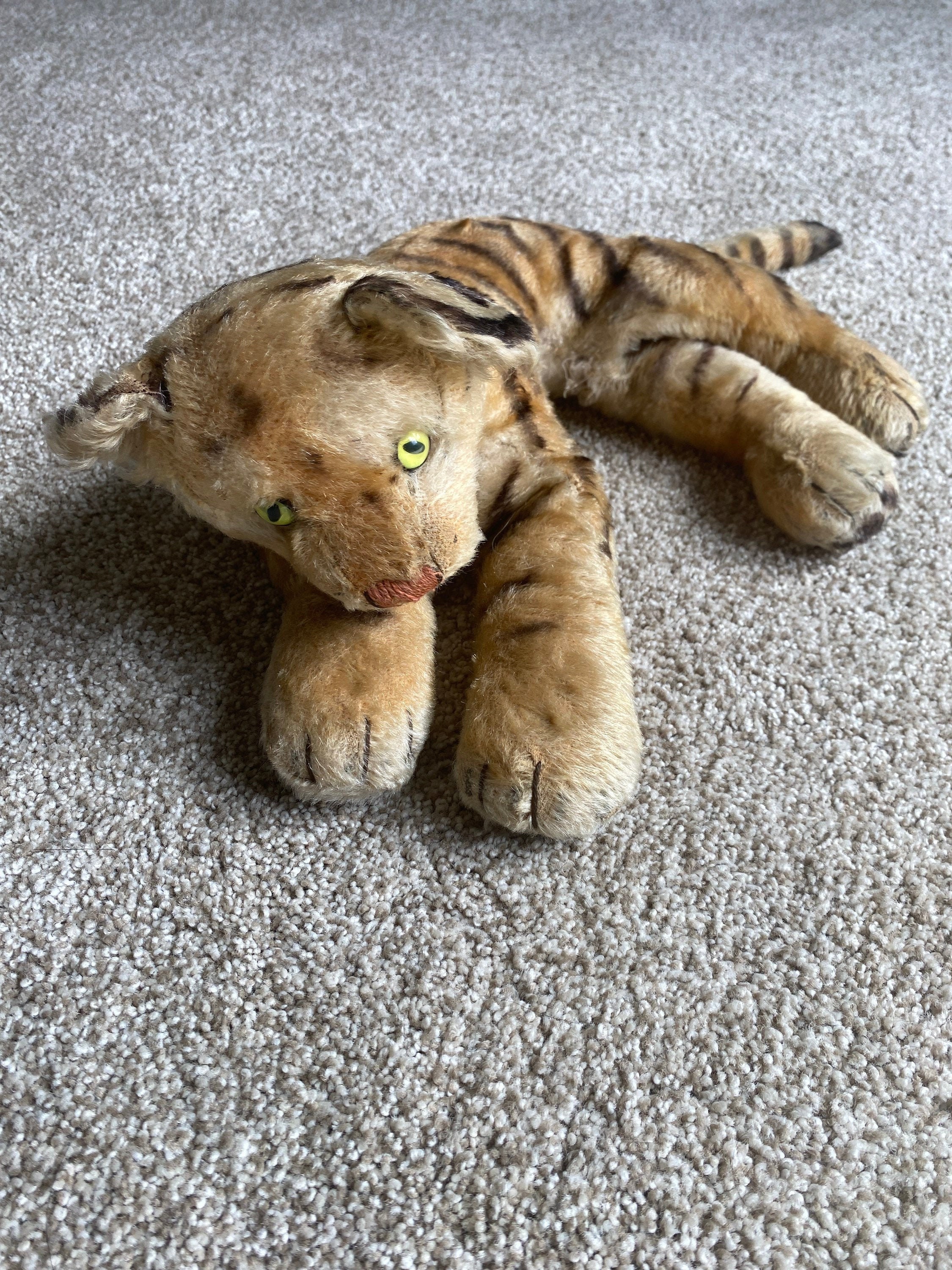 Vintage tiger stuffed animal appears to be a Steiff Etsy