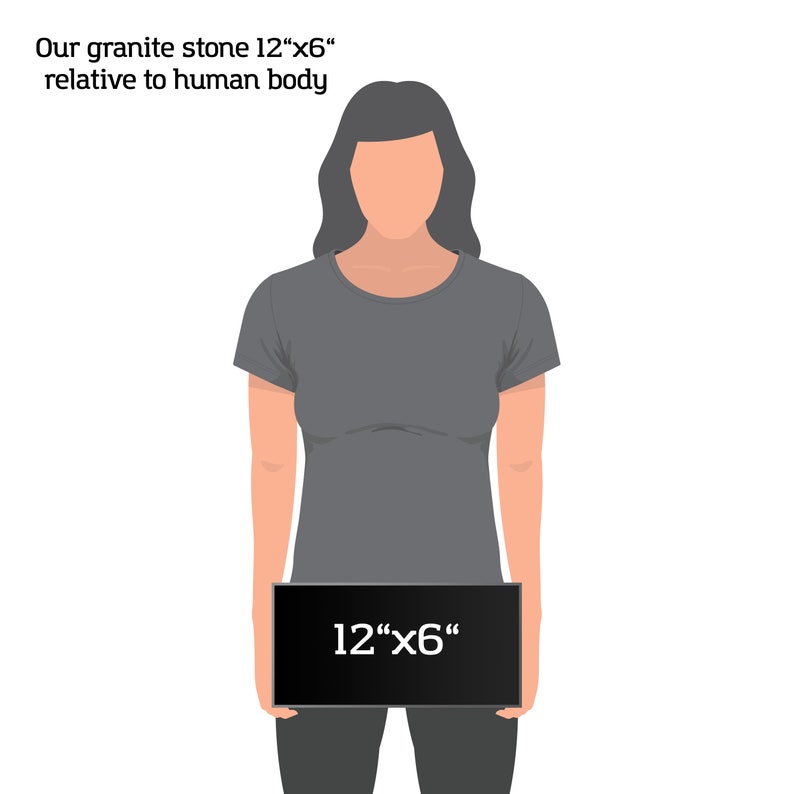 May include: A person holding a black rectangular sign with the text "12"x6" written in white. The sign is being held in front of the person's torso, which is wearing a gray t-shirt.