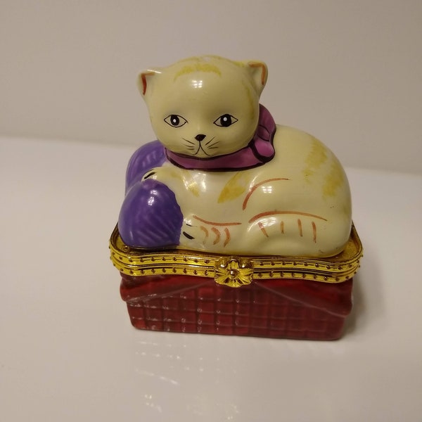 Vintage porcelain cat in basket trinket box, pill box, hinged lid, Limoges style, kitten