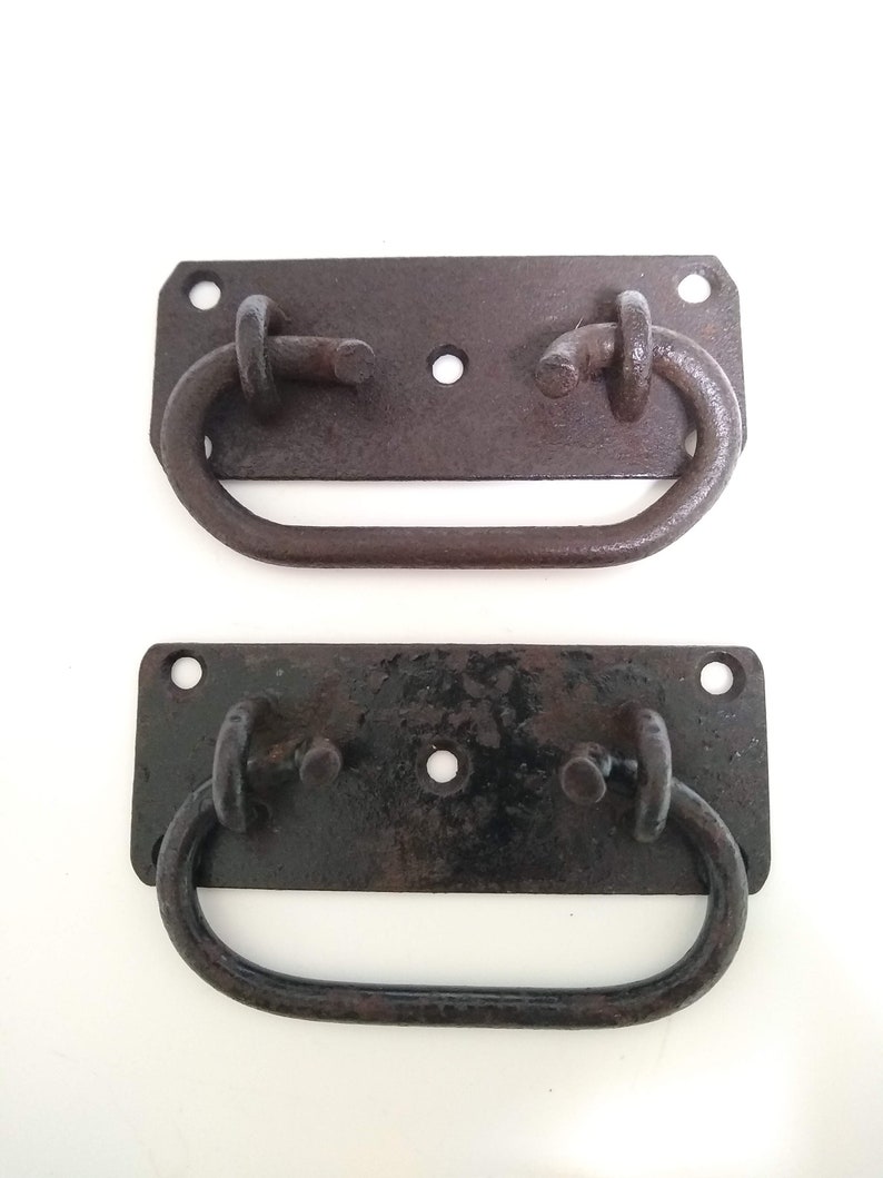 Lot of two vintage hand forged iron or steel trunk handles