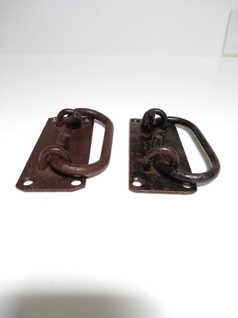 Lot of two vintage hand forged iron or steel trunk handles