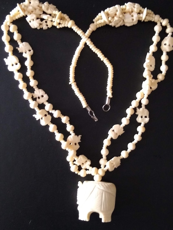 Vintage carved bone elephant pendant, necklace - image 1