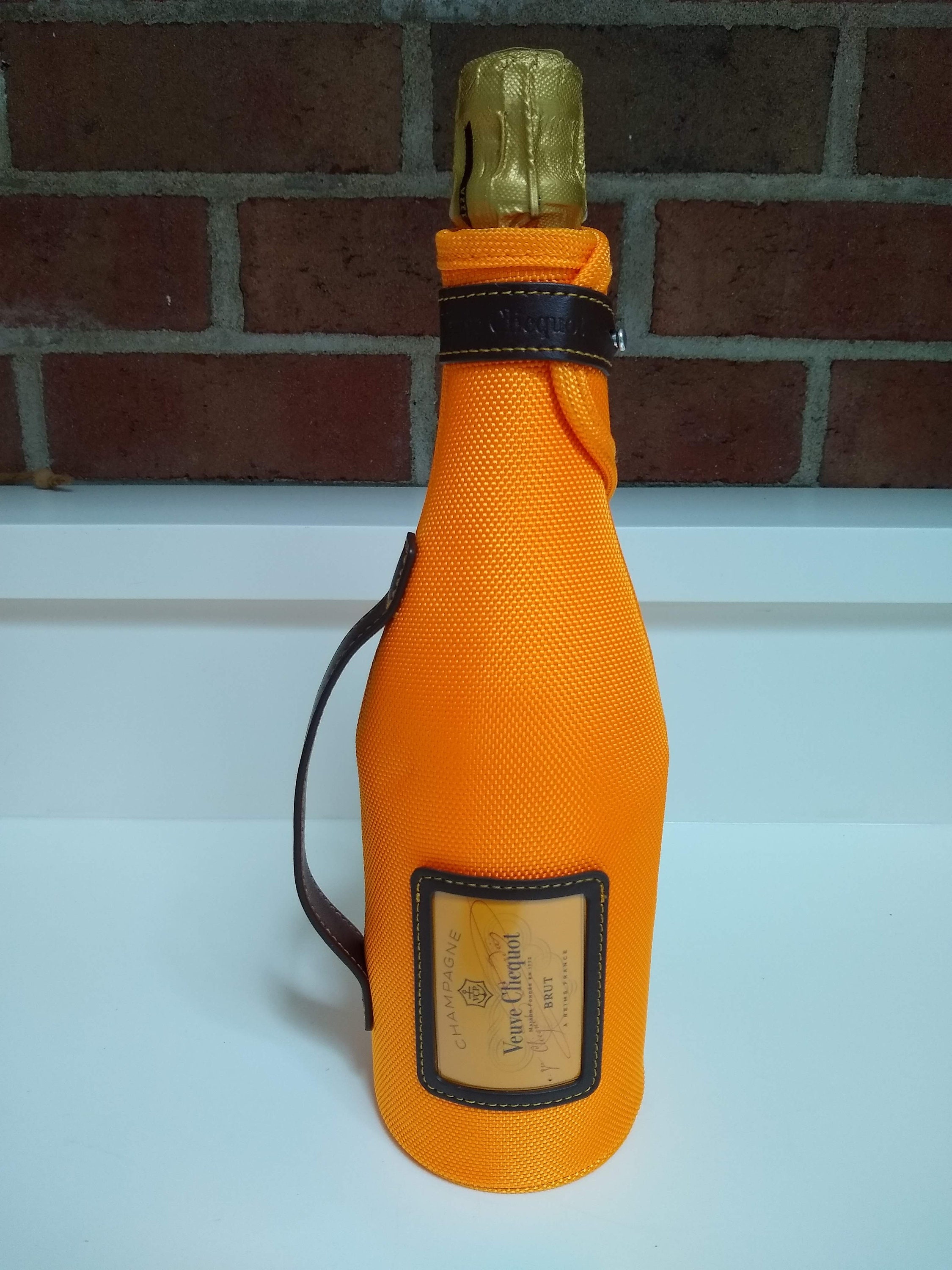 Champagne in orange bag sales