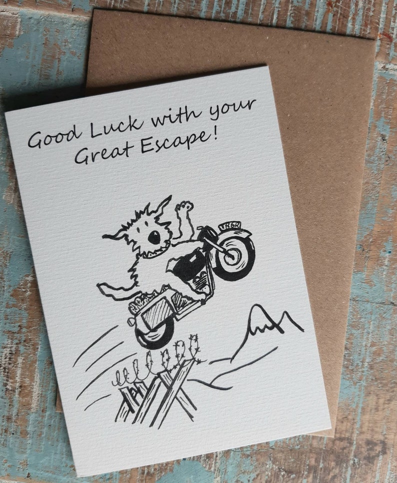 May include: A black and white illustration of a dog riding a motorbike over a fence. The card reads "Good Luck with your Great Escape!"