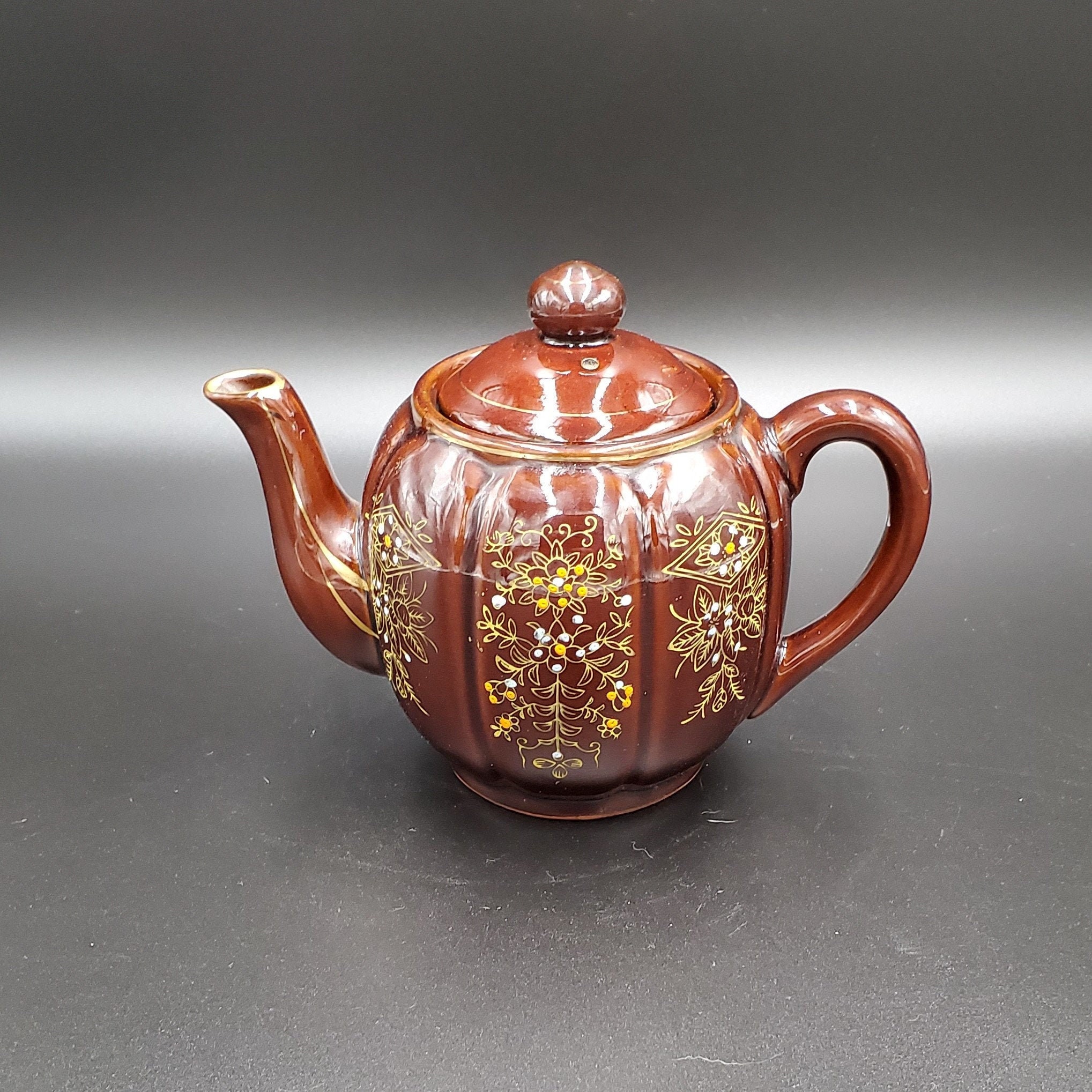 Brown teapot made in japan