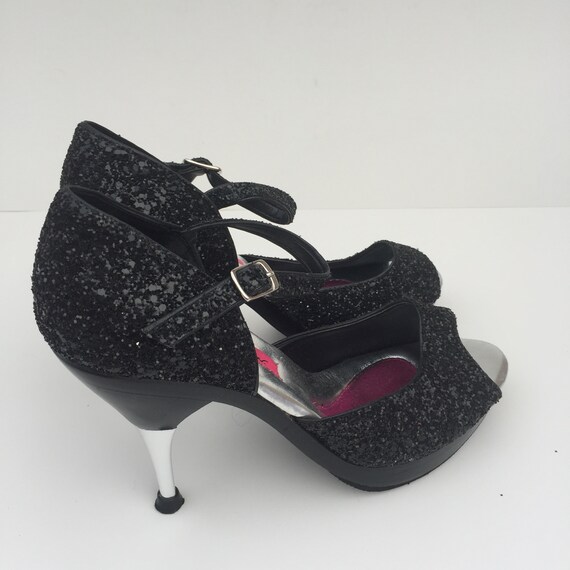black glitter heels with strap
