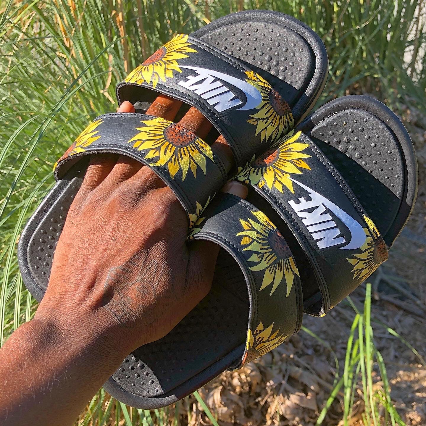 nike slides with sunflowers on them