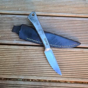 Hand forged integral utility knife and sheath