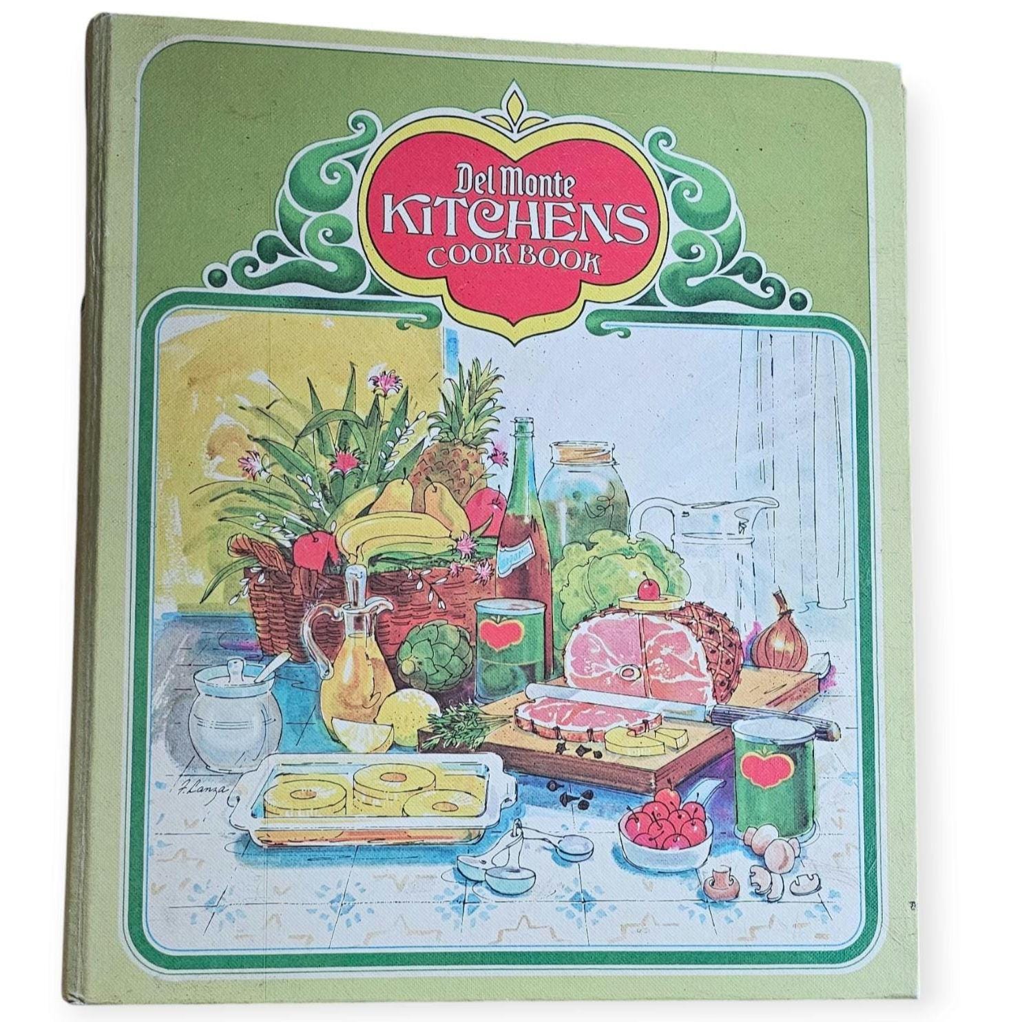 A vintage 1970s Del Monte Kitchens cookbook in a ring binder, hardcover, first printing from 1972, with tabbed sections.