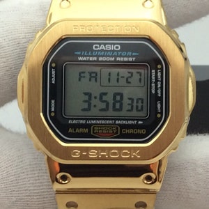 Gold plated Casio G-Shock DW5600E Custom Full Metal Gold Stainless Steel Nice