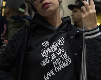 She Remembered Who She Was and the Game Changed - Unisex Hoodie