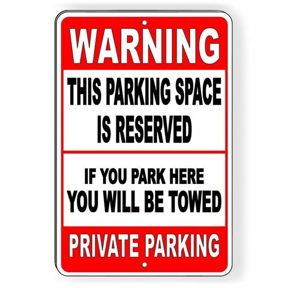 This Parking Space Reserved Park Here You Will Be Towed Sign