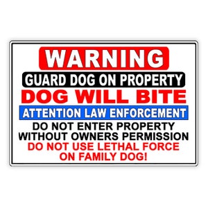 May include: A rectangular white sign with a black border. The sign has the word "WARNING" in red at the top, followed by text in black and red warning of a guard dog. The sign also includes a warning to law enforcement.