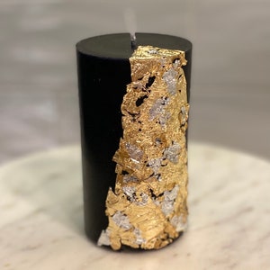 Black pillar candle with gold foil image 1