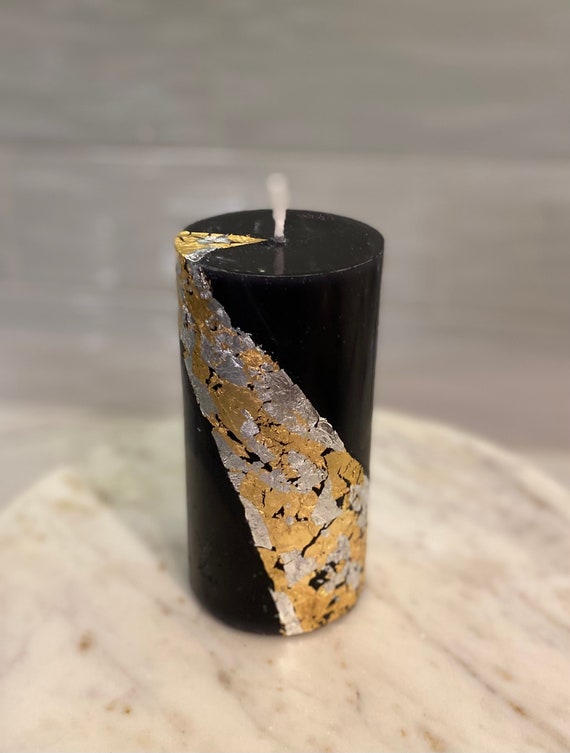Black pillar candle with twisted gold foil Etsy Nederland
