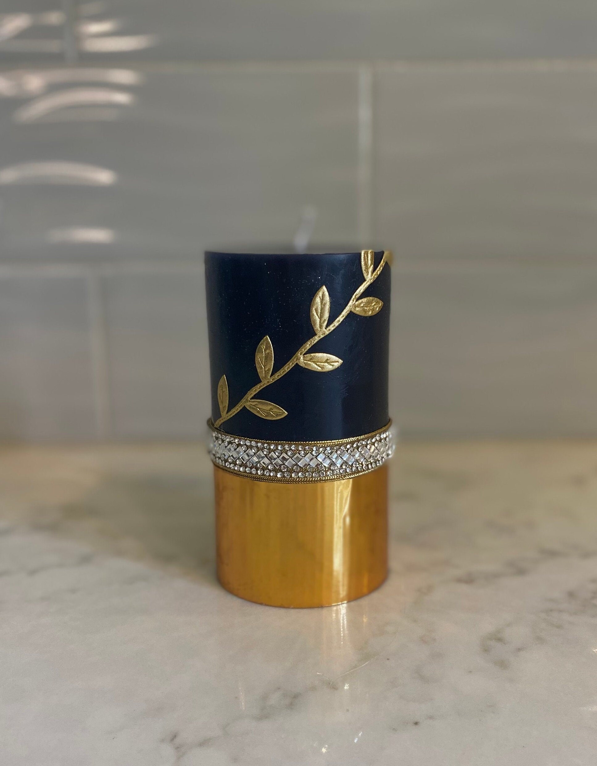 Black pillar candle with gold accents Etsy Italia