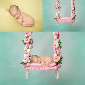 May include: A newborn baby sleeping on a pink swing decorated with pink and white flowers. The swing is hanging from a light blue background.